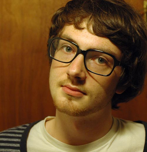 young man glasses photo